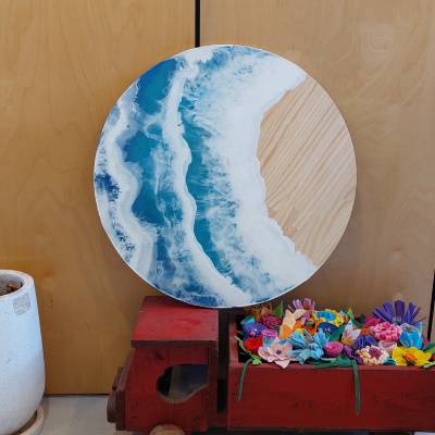 Ocean waves in resin on pine wood